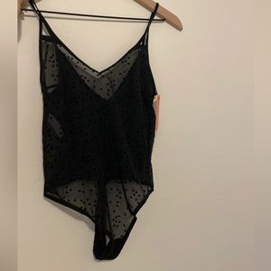 NWT Sheer star thong bodysuit